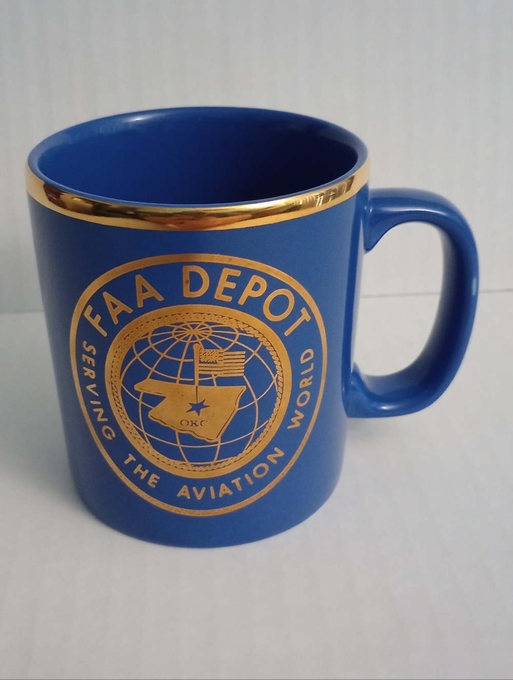 FAA Depot Serving The Aviation World Mug OKC Blue With Gold Lettering